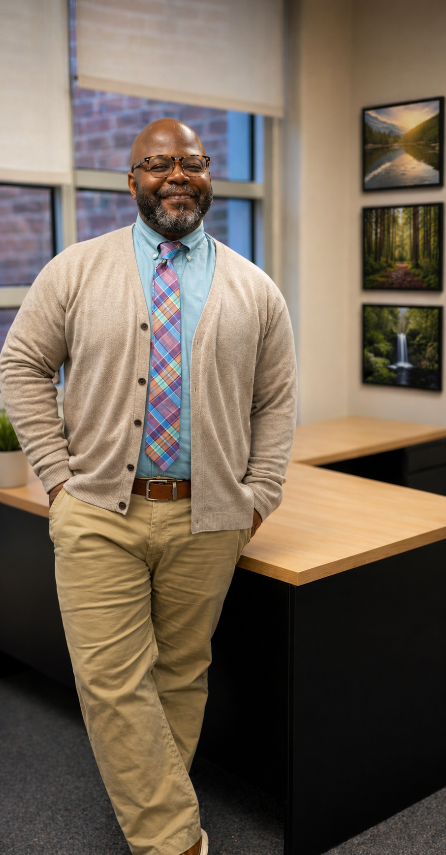 Portrait of the counselor at Atomic Change Counseling, standing in a warm, welcoming office
